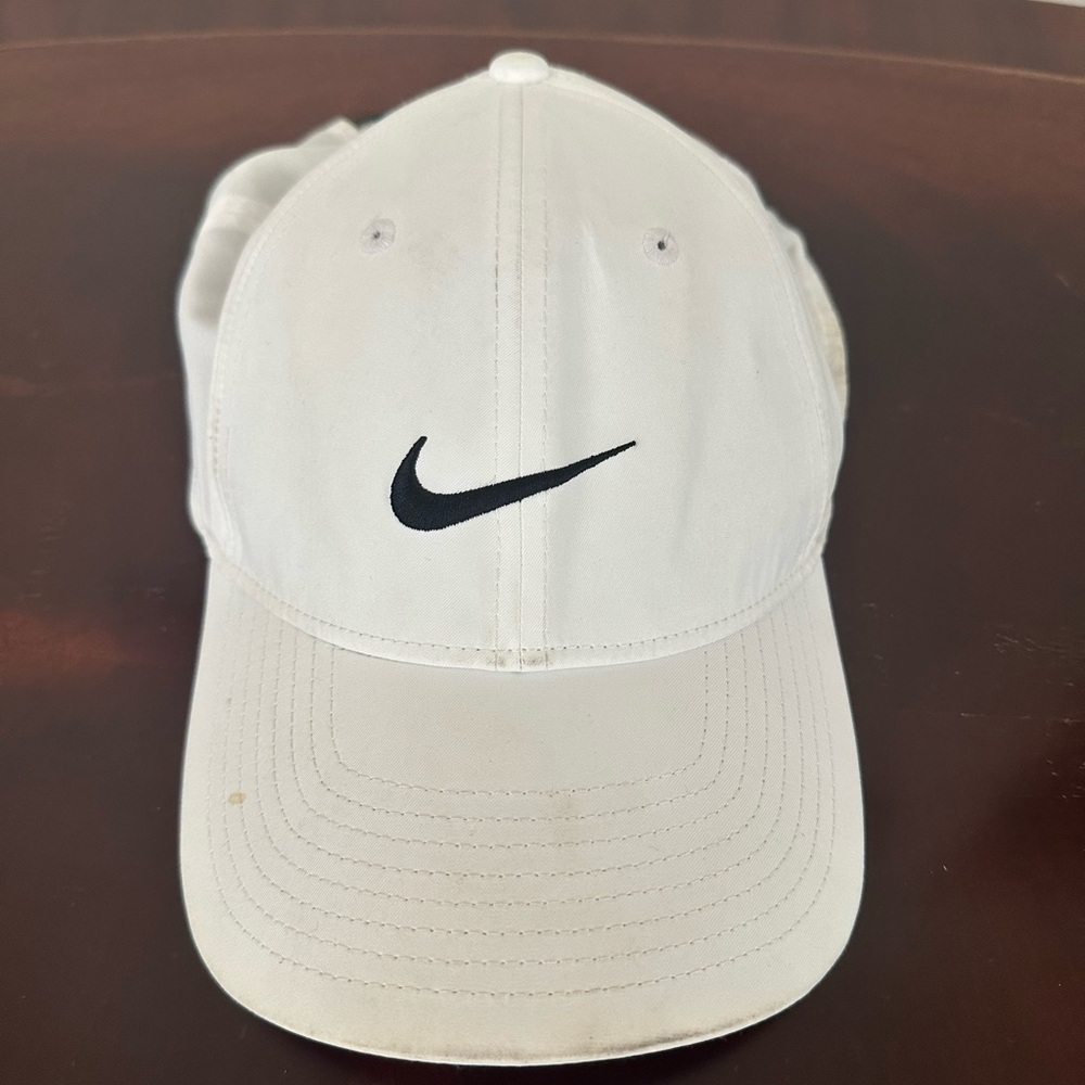 THREE Nike caps